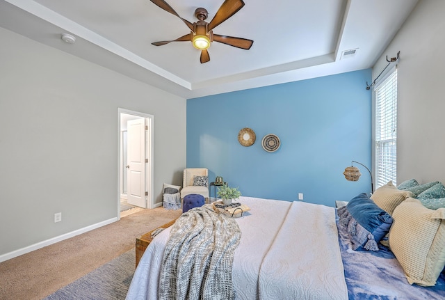 7690 High Maple Cir N, Charleston, SC 29418 - bedroom featuring a raised ceiling, carpet, baseboards, and a ceiling fan