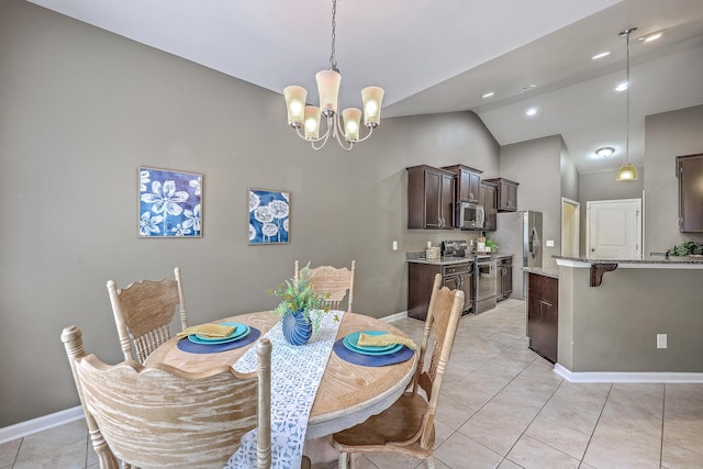 7690 High Maple Cir N, Charleston, SC 29418 - dining space featuring a chandelier, light tile patterned floors, high vaulted ceiling, and baseboards