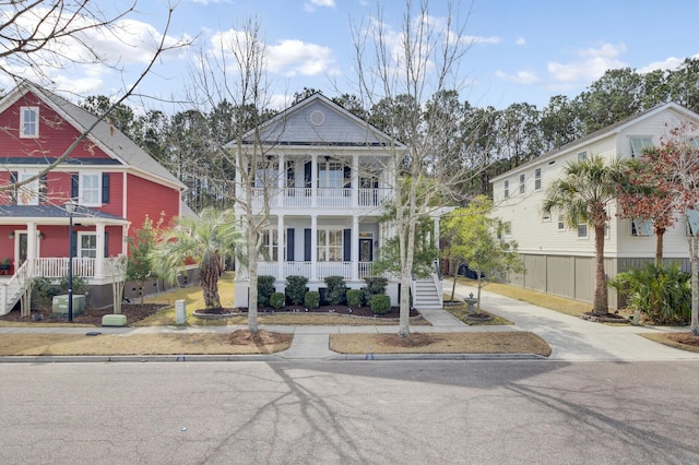 view of front of home featuring a porch and a balcony