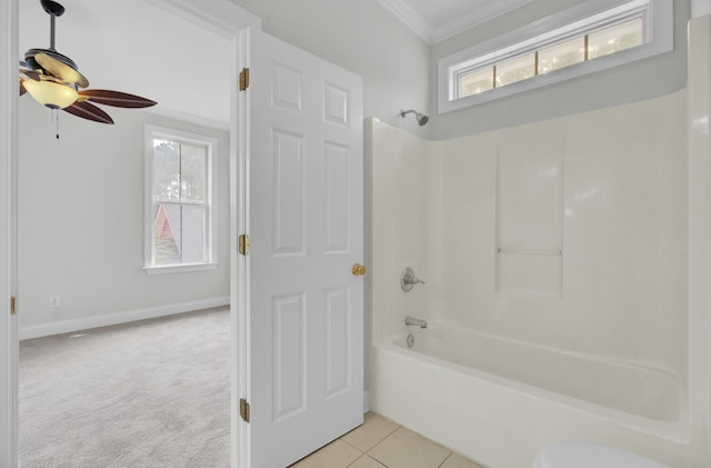 bathroom featuring ornamental molding, plenty of natural light, shower / tub combination, and tile patterned floors