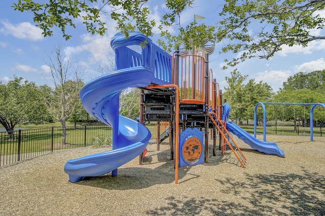 community jungle gym with fence