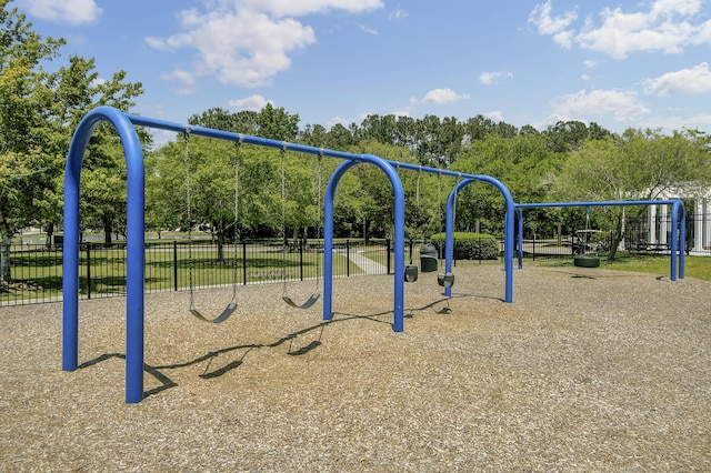 community jungle gym with fence