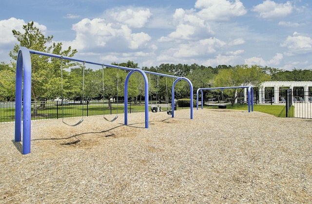 community jungle gym with fence