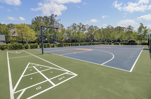 view of sport court featuring community basketball court and fence