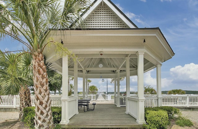 exterior space with a gazebo and a wooden deck