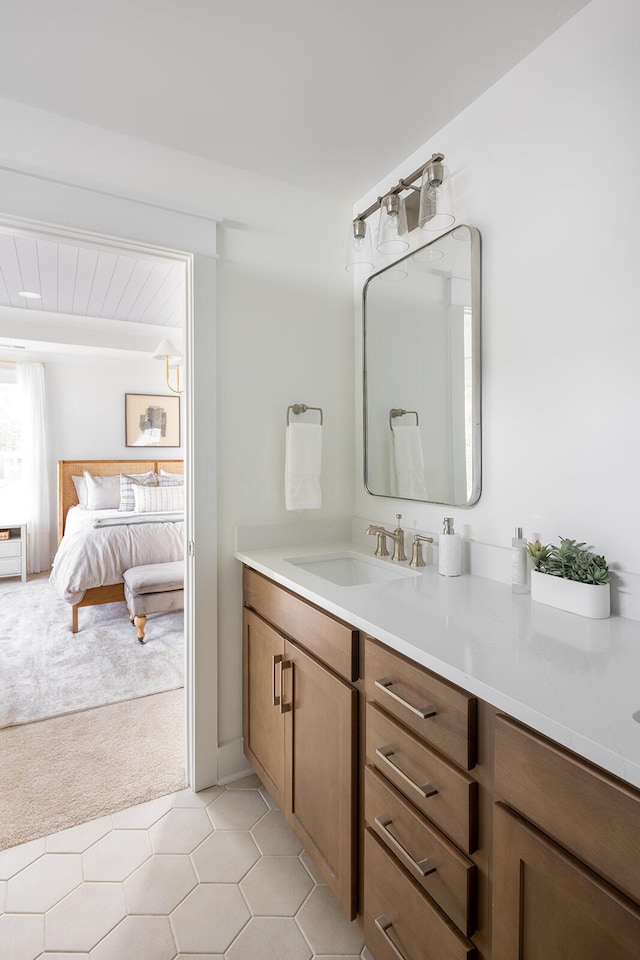 bathroom with vanity and tile patterned flooring