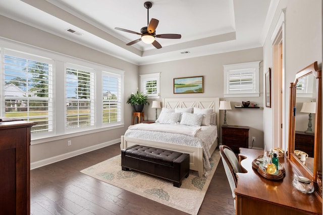 3726 Orion Ln, Mount Pleasant, SC 29466 - bedroom with a tray ceiling, dark wood-type flooring, a ceiling fan, baseboards, and ornamental molding