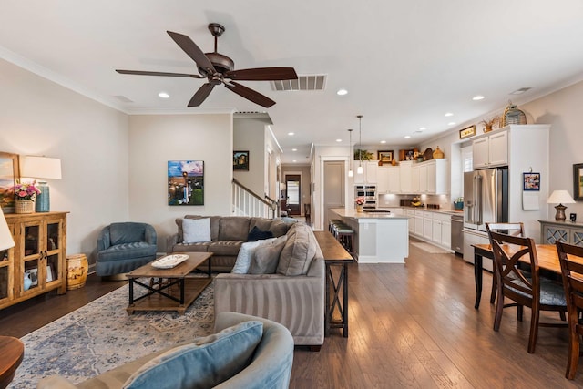 3726 Orion Ln, Mount Pleasant, SC 29466 - living area featuring stairway, ceiling fan, ornamental molding, dark wood-style flooring, and recessed lighting