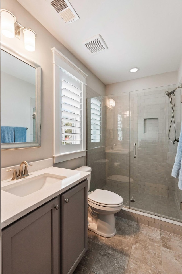 3726 Orion Ln, Mount Pleasant, SC 29466 - bathroom featuring toilet, a shower stall, vanity, and recessed lighting