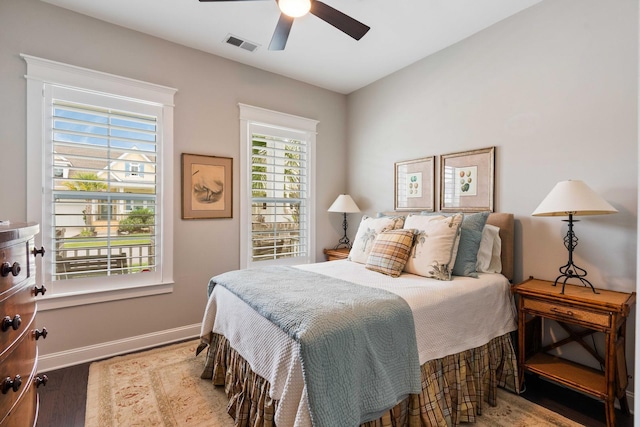 3726 Orion Ln, Mount Pleasant, SC 29466 - bedroom featuring wood finished floors, baseboards, and a ceiling fan