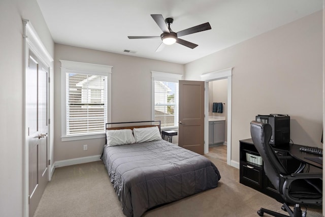 3726 Orion Ln, Mount Pleasant, SC 29466 - bedroom with an office area, light colored carpet, baseboards, ensuite bath, and a ceiling fan