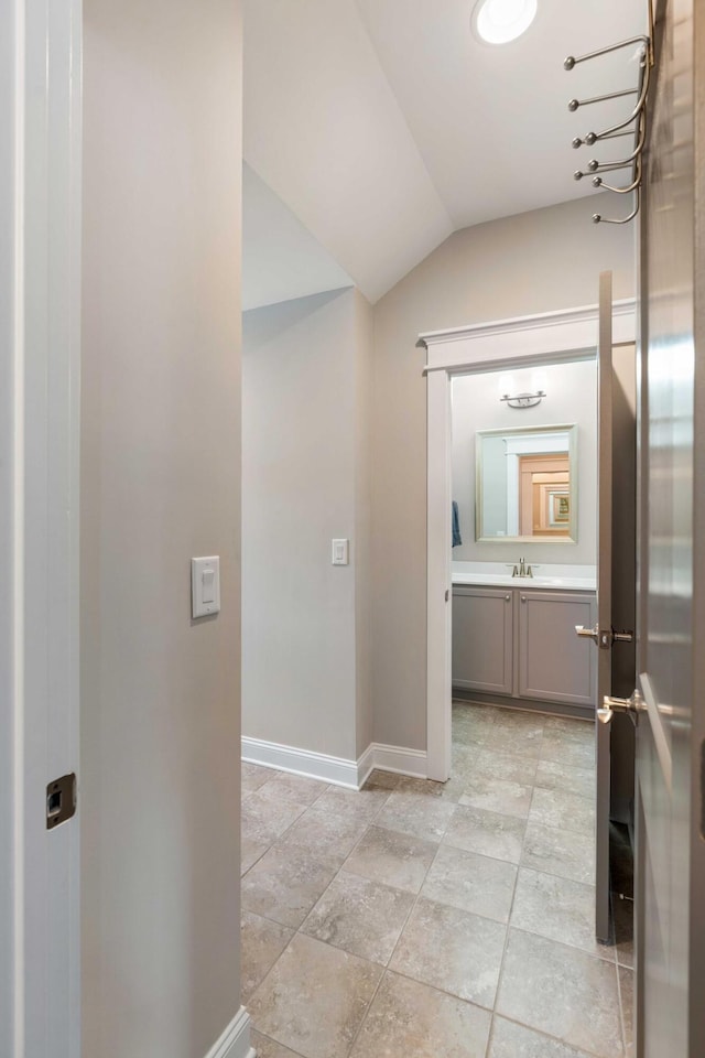 3726 Orion Ln, Mount Pleasant, SC 29466 - corridor with lofted ceiling, baseboards, and a sink