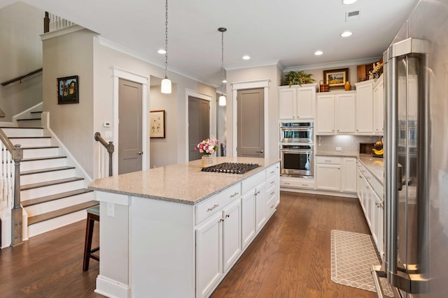 3726 Orion Ln, Mount Pleasant, SC 29466 - kitchen featuring ornamental molding, stainless steel appliances, dark wood-style flooring, a kitchen island, and recessed lighting