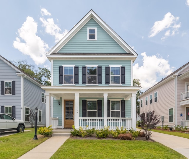 1150 Oak Bluff Ave, Charleston, SC 29492 - view of front facade featuring a porch and a front yard