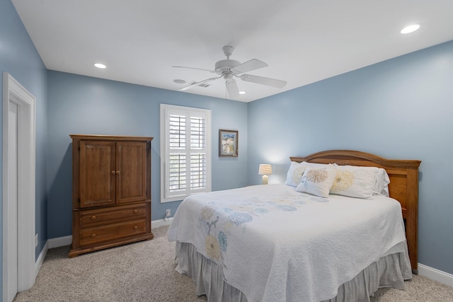 bedroom featuring light colored carpet, baseboards, a ceiling fan, and recessed lighting