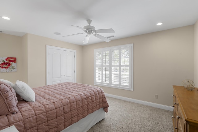 carpeted bedroom with ceiling fan, baseboards, visible vents, and recessed lighting