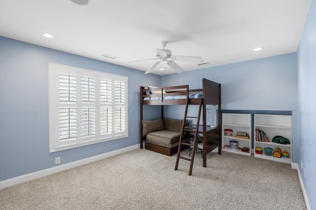 carpeted bedroom with recessed lighting, visible vents, and baseboards