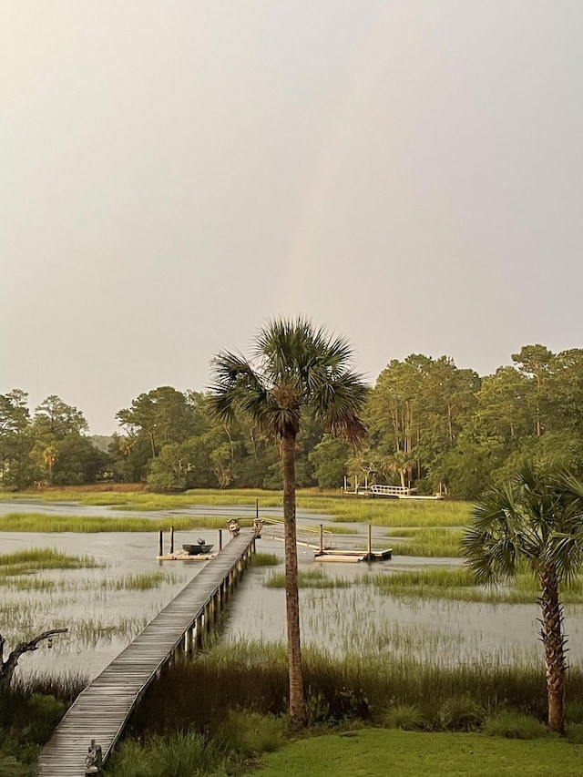 view of home's community featuring a water view