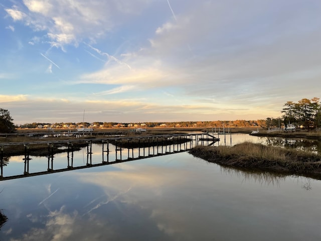 view of water feature with a dock