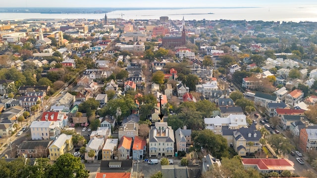 bird's eye view with a water view and a residential view