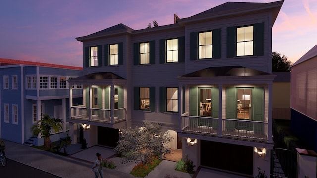 view of front of home with a balcony