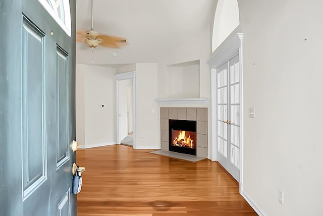 8800 Dorchester Rd Unit 2004, North Charleston, SC 29420 - entrance foyer featuring wood finished floors, a tiled fireplace, and a ceiling fan