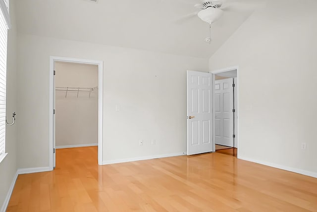 8800 Dorchester Rd Unit 2004, North Charleston, SC 29420 - unfurnished bedroom featuring light wood-style flooring, a spacious closet, vaulted ceiling, a closet, and ceiling fan