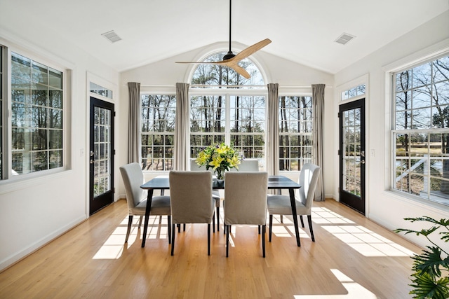 sunroom / solarium featuring vaulted ceiling and ceiling fan