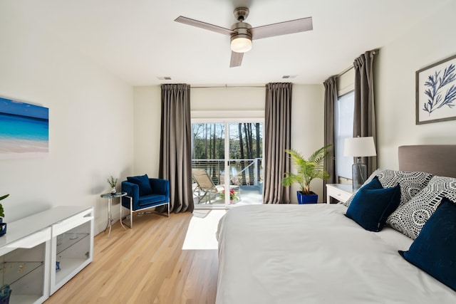 bedroom with ceiling fan, access to outside, and light hardwood / wood-style floors