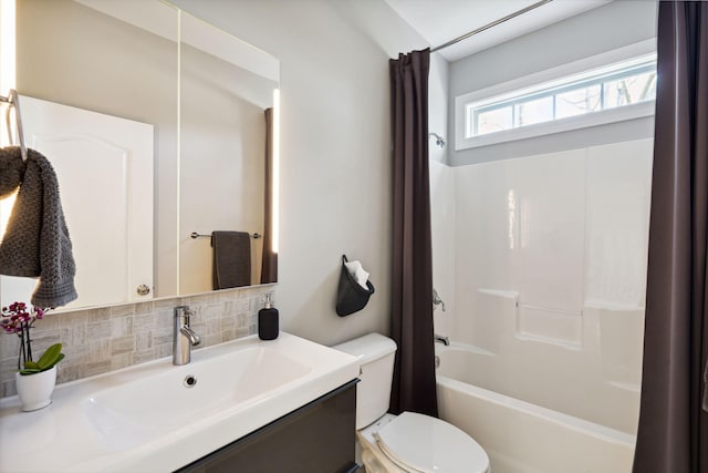 full bathroom with tasteful backsplash, vanity, shower / bathtub combination with curtain, and toilet