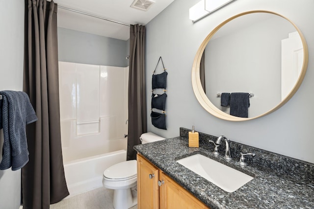 full bathroom with vanity, toilet, and shower / bath combo with shower curtain