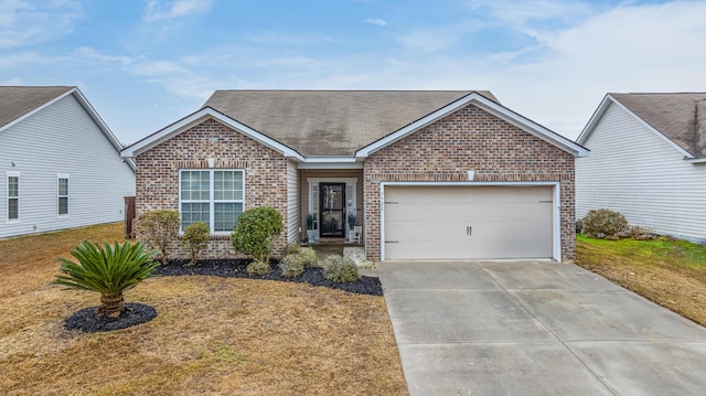 ranch-style house featuring a garage, a front lawn, brick siding, and driveway