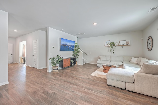 living room with hardwood / wood-style floors