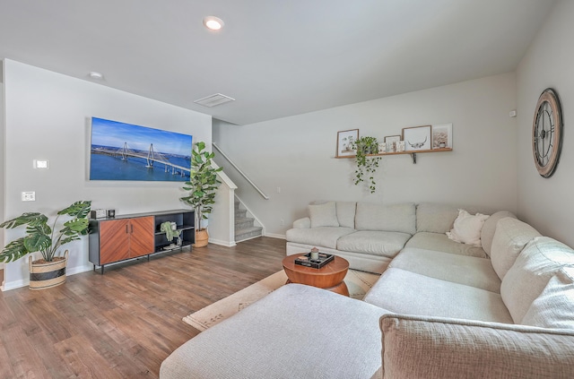 living room with dark wood-type flooring