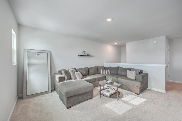 living room featuring light carpet