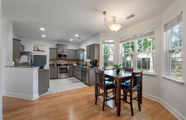 8328 Berringer Blf, North Charleston, SC 29418 - dining space with healthy amount of natural light, light wood-style flooring, and recessed lighting