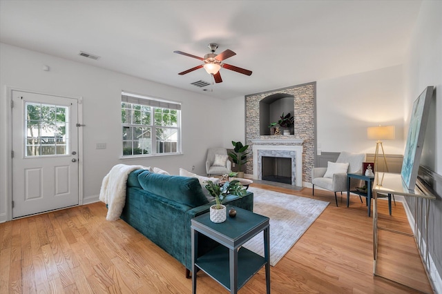 8328 Berringer Blf, North Charleston, SC 29418 - living area featuring a large fireplace, light wood-style flooring, and a ceiling fan