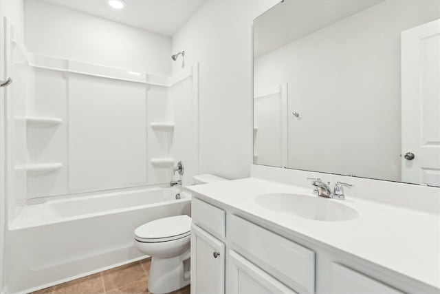 full bathroom featuring tile patterned flooring, vanity, toilet, and shower / bathing tub combination