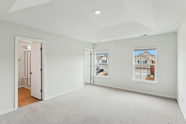 unfurnished bedroom featuring light colored carpet