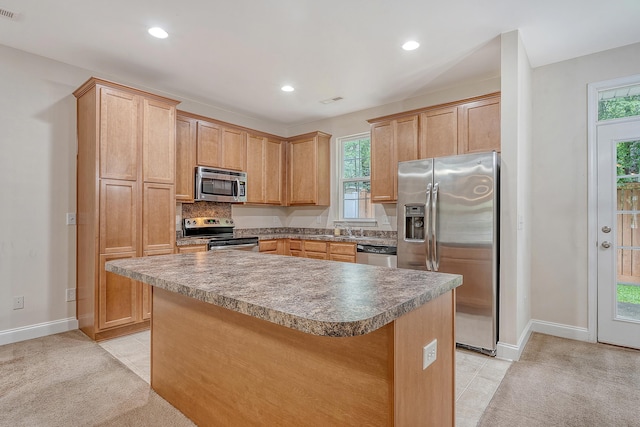 9646 Scarborough Ct, Summerville, SC 29485 - kitchen with stainless steel appliances, a center island, recessed lighting, healthy amount of natural light, and baseboards
