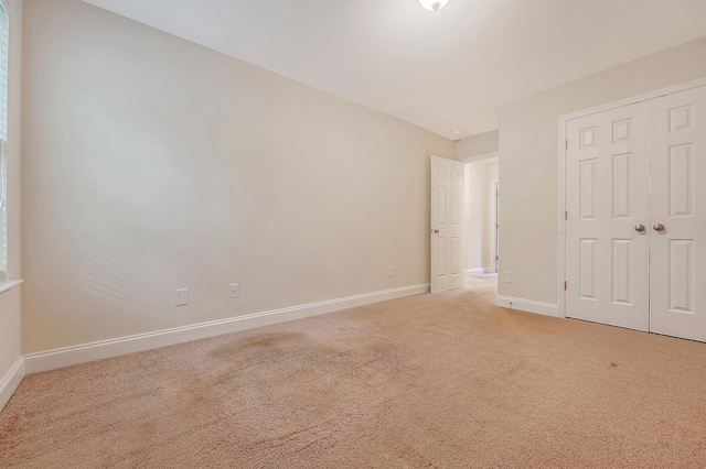 9646 Scarborough Ct, Summerville, SC 29485 - unfurnished bedroom featuring baseboards, light colored carpet, and a closet