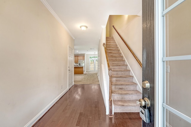 9646 Scarborough Ct, Summerville, SC 29485 - foyer featuring dark wood-type flooring, stairway, baseboards, and crown molding