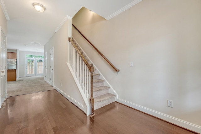 9646 Scarborough Ct, Summerville, SC 29485 - stairway featuring wood finished floors, baseboards, and crown molding