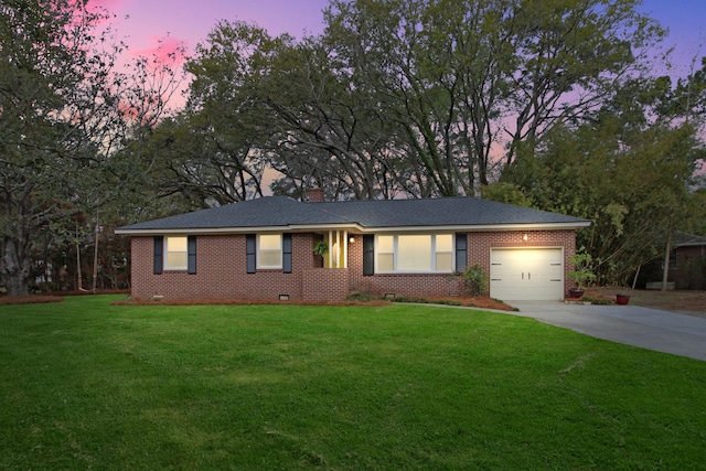 ranch-style house featuring driveway, a garage, crawl space, a yard, and brick siding