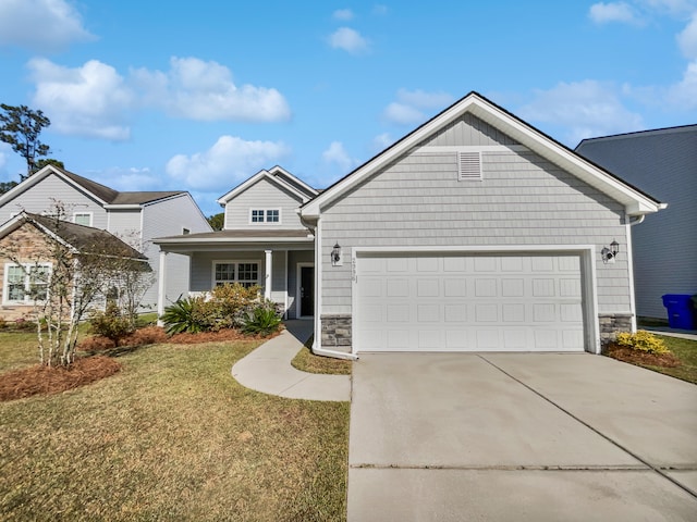 view of front facade with a front lawn and a garage