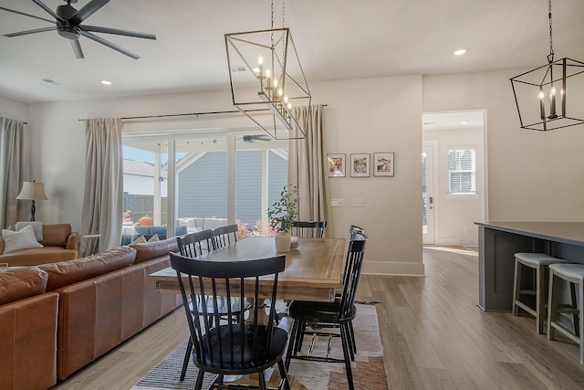 dining space with recessed lighting, wood finished floors, baseboards, and ceiling fan