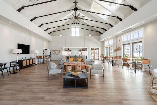 643 Blueway Ave, Summerville, SC 29486 - living room featuring beamed ceiling, high vaulted ceiling, and wood finished floors