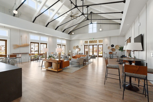 643 Blueway Ave, Summerville, SC 29486 - living area with beamed ceiling, high vaulted ceiling, and wood finished floors