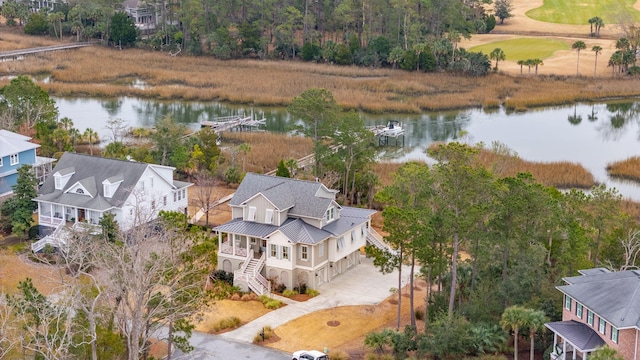 drone / aerial view with a water view