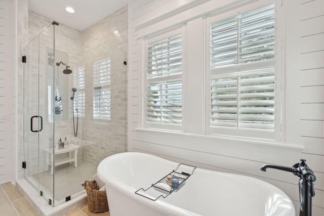 bathroom featuring plus walk in shower